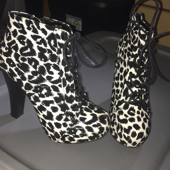 Charlotte Russe Shoes - NWOT Charlotte Russe platform animal print booties